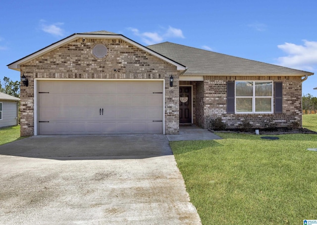 single story home featuring brick siding, roof with shingles, a garage, driveway, and a front lawn