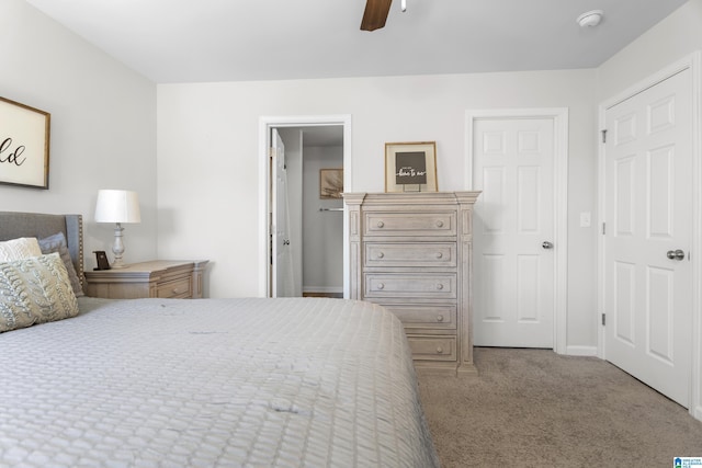 bedroom with carpet floors and a ceiling fan