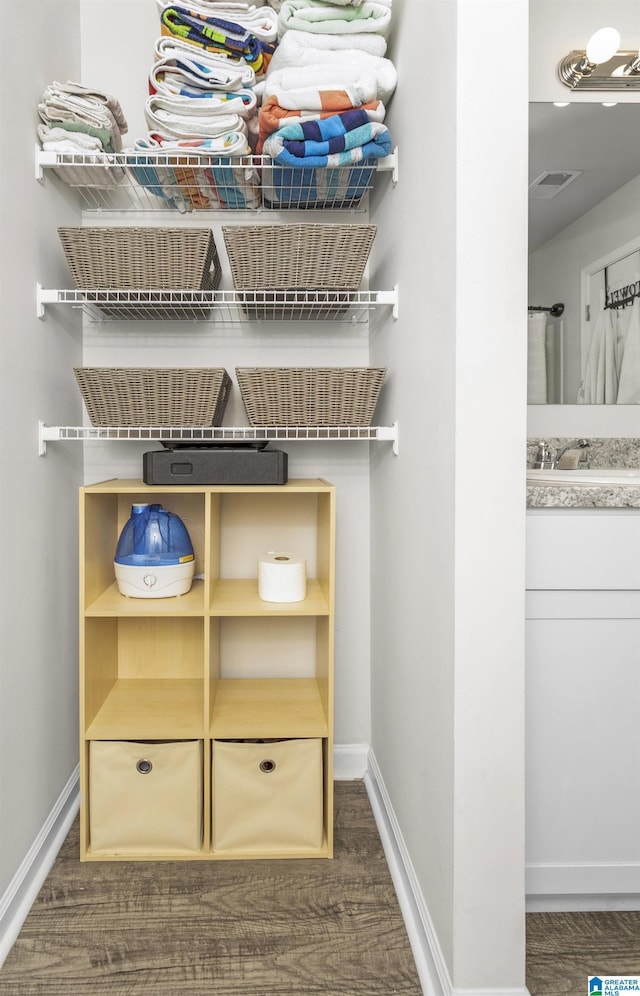 interior space featuring a sink and visible vents