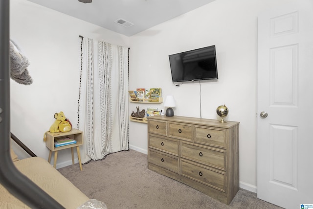 bedroom featuring carpet, visible vents, and baseboards