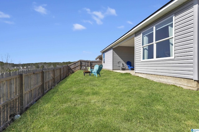 view of yard featuring a fenced backyard