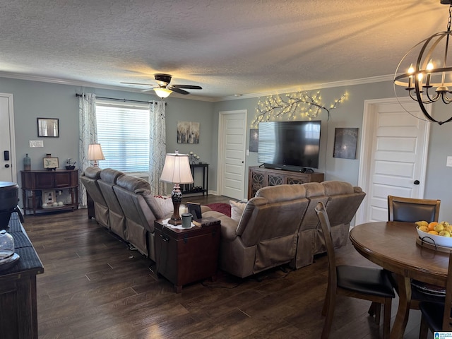 living room with a textured ceiling, dark wood finished floors, and crown molding