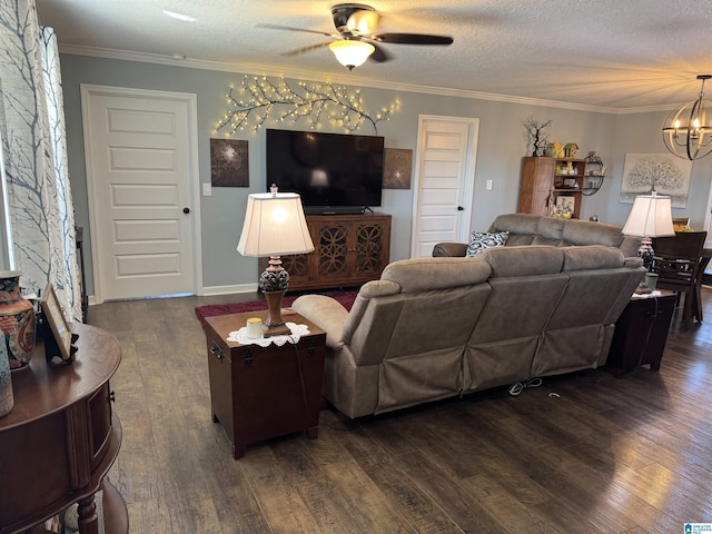 living room featuring a textured ceiling, dark wood finished floors, and crown molding