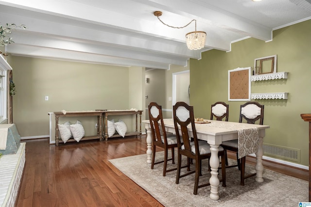 dining room with baseboards, visible vents, beamed ceiling, wood finished floors, and a notable chandelier