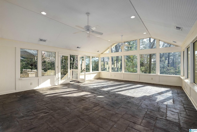 unfurnished sunroom featuring visible vents, lofted ceiling, and a ceiling fan