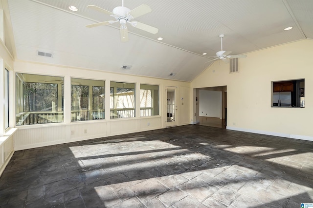 unfurnished sunroom featuring visible vents, ceiling fan, and vaulted ceiling