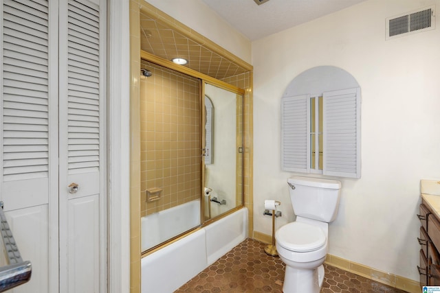 bathroom featuring vanity, baseboards, visible vents, a closet, and toilet