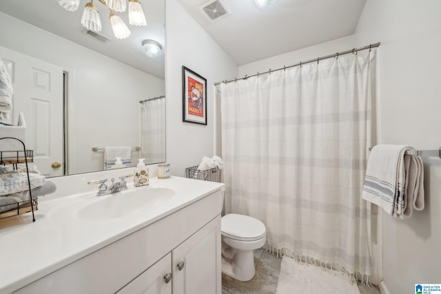 bathroom with toilet, vanity, visible vents, and a shower with curtain