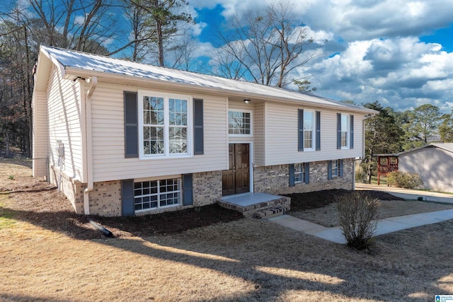 bi-level home with metal roof