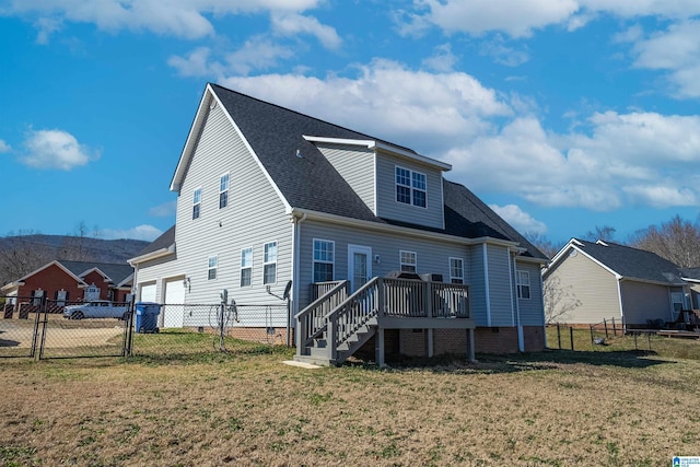 back of property featuring crawl space, a fenced backyard, a yard, and a deck