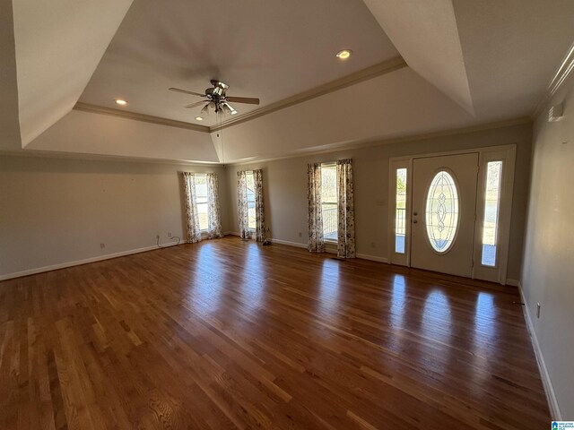 entrance foyer with a raised ceiling and a wealth of natural light