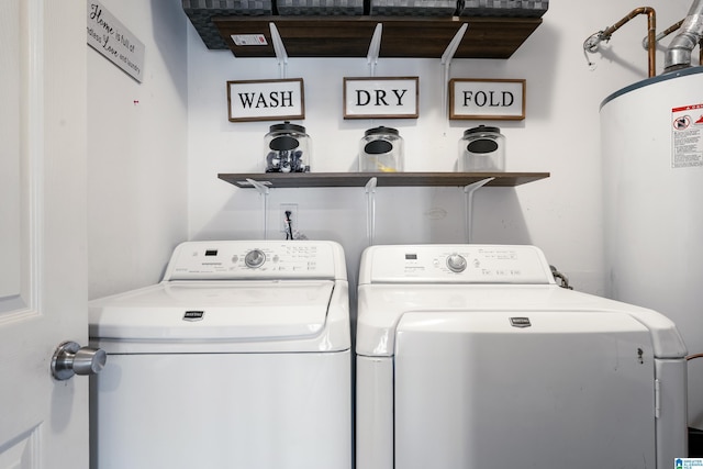 washroom featuring laundry area and independent washer and dryer