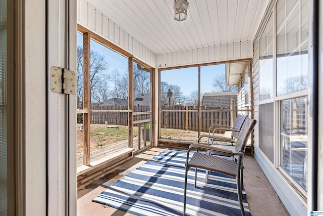 unfurnished sunroom with plenty of natural light