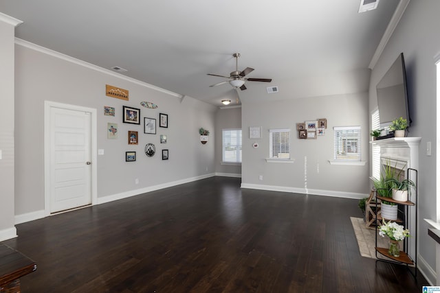 unfurnished living room featuring dark wood-type flooring, a fireplace with flush hearth, visible vents, a ceiling fan, and ornamental molding