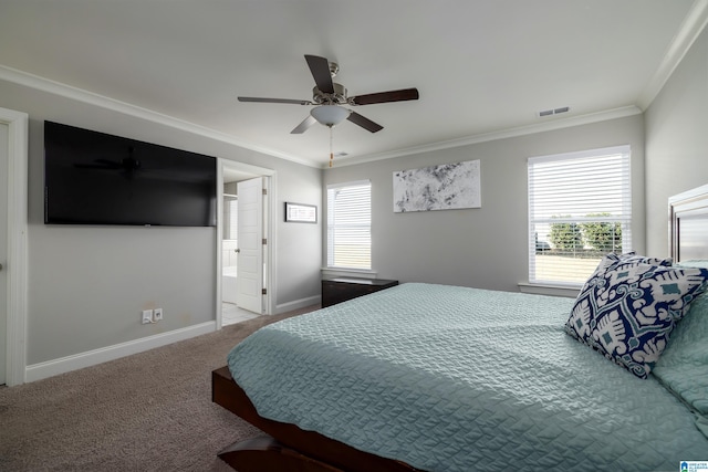 bedroom featuring ornamental molding, multiple windows, and carpet flooring