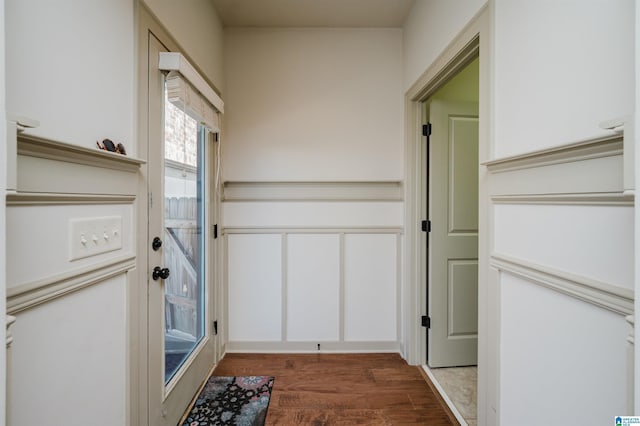 entryway with wood finished floors