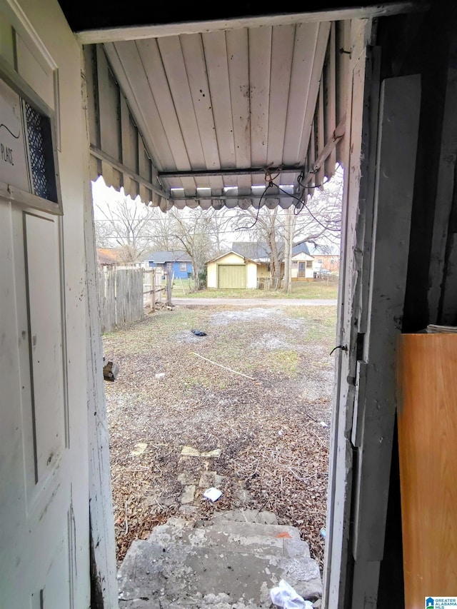 view of yard with an attached carport