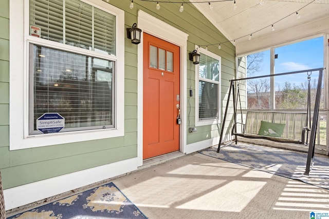 entrance to property with a porch