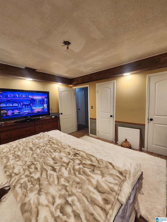 unfurnished bedroom with a textured ceiling