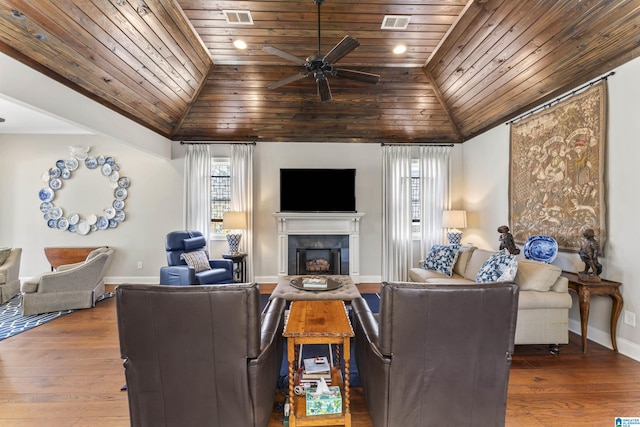 living room with vaulted ceiling, wood ceiling, and hardwood / wood-style flooring