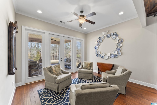 living area featuring plenty of natural light, baseboards, wood-type flooring, and french doors