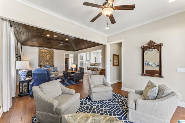 living room featuring crown molding, lofted ceiling, hardwood / wood-style floors, wood ceiling, and baseboards