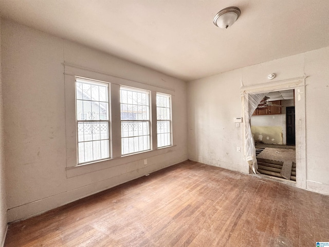 unfurnished room featuring wood finished floors