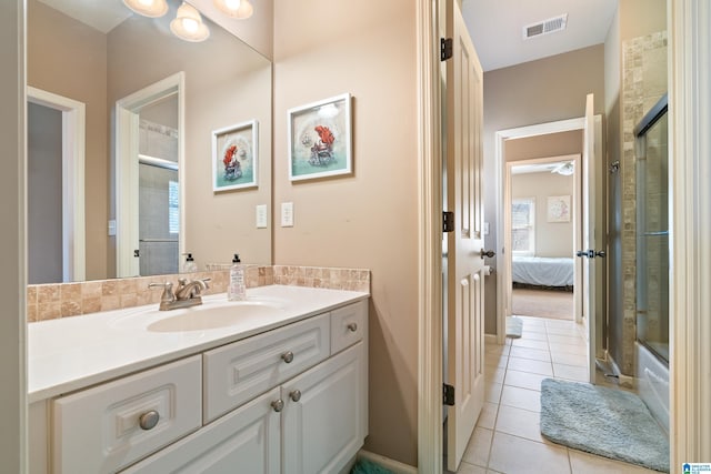 ensuite bathroom with ensuite bath, an enclosed shower, visible vents, and tile patterned floors