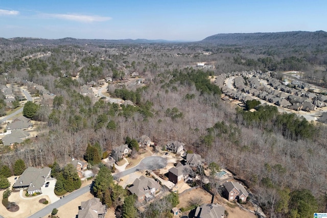 aerial view featuring a residential view and a forest view