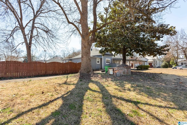 view of yard with fence