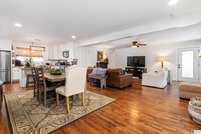 dining area with ceiling fan, wood finished floors, and recessed lighting