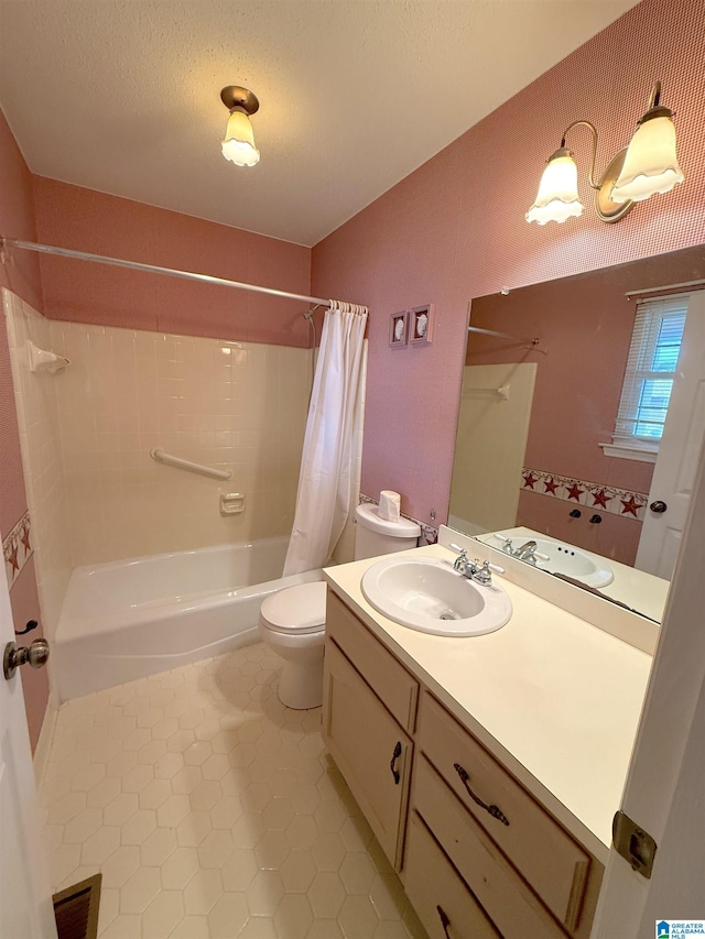 full bath with shower / bathtub combination with curtain, toilet, vanity, a textured ceiling, and tile patterned floors