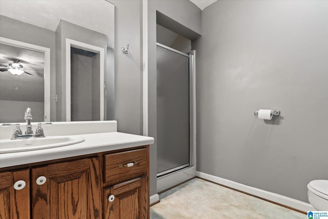 65 Jessica Dr, Wedowee, AL 36278 - full bath with vanity, baseboards, toilet, a shower stall, and ceiling fan