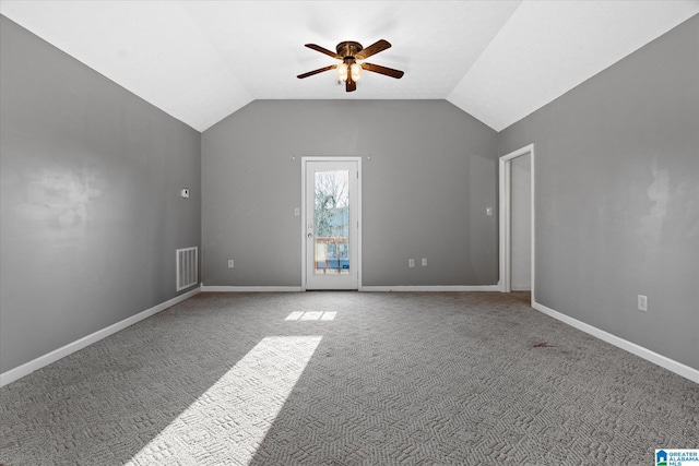 65 Jessica Dr, Wedowee, AL 36278 - empty room featuring a ceiling fan, visible vents, carpet floors, lofted ceiling, and baseboards