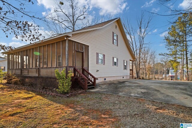 65 Jessica Dr, Wedowee, AL 36278 - view of home's exterior featuring a sunroom and crawl space