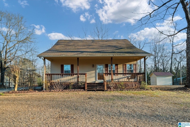 65 Jessica Dr, Wedowee, AL 36278 - view of front of house featuring a porch, an outdoor structure, and roof with shingles