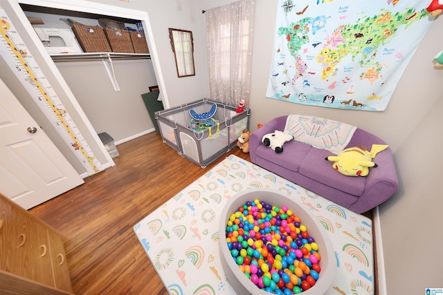 playroom with wood finished floors