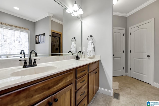 bathroom with double vanity, visible vents, a sink, and ornamental molding