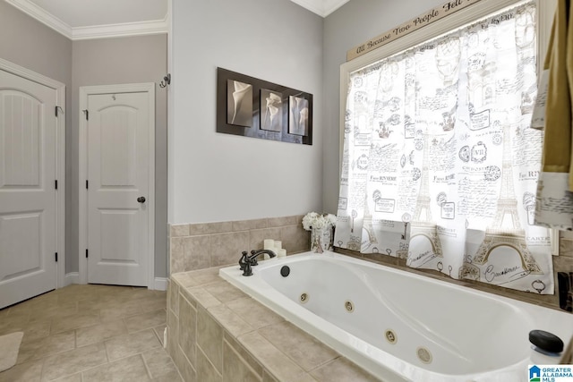 bathroom with a tub with jets, tile patterned flooring, and crown molding