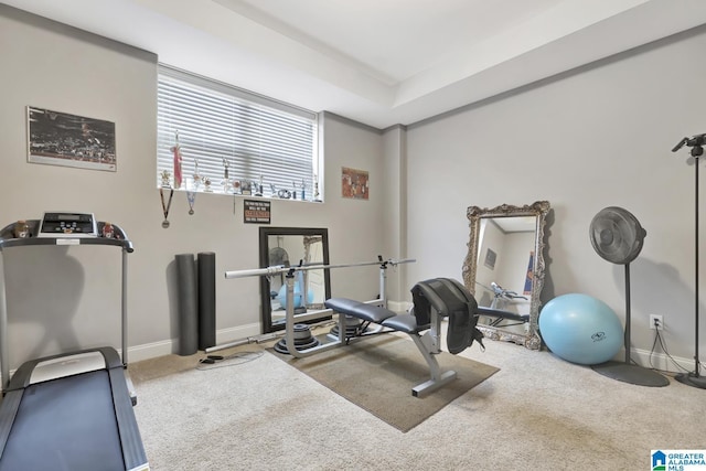 exercise area with carpet and baseboards