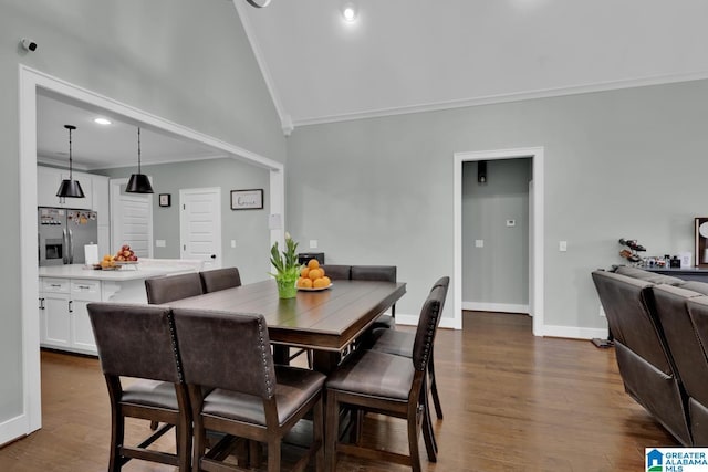 dining area with baseboards, lofted ceiling, recessed lighting, ornamental molding, and dark wood-type flooring