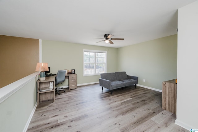 office with ceiling fan, baseboards, and wood finished floors