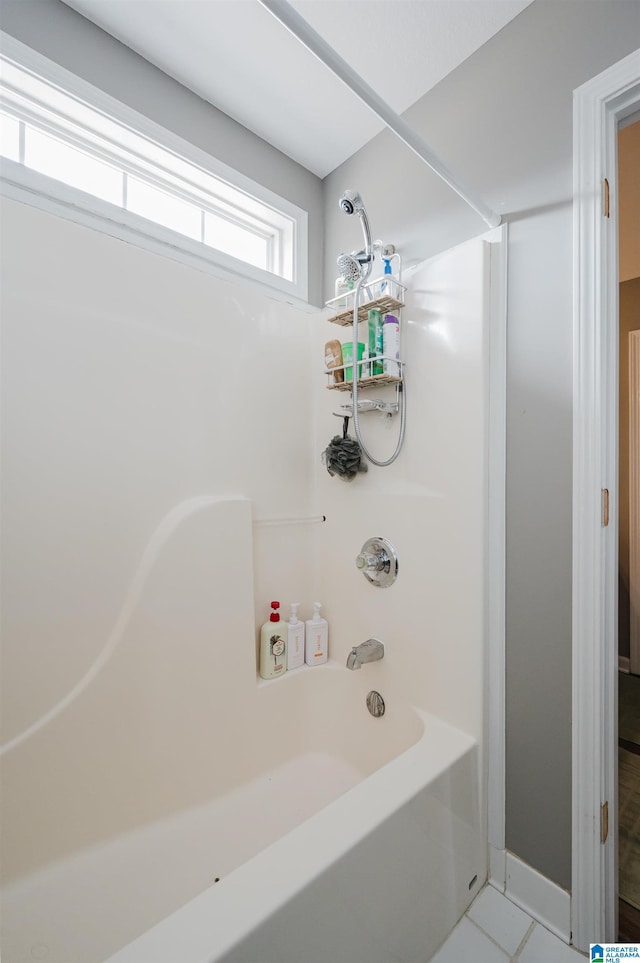 bathroom with  shower combination and tile patterned flooring