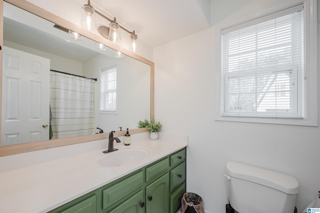 full bath with vanity and toilet