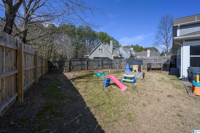 view of yard featuring a fenced backyard