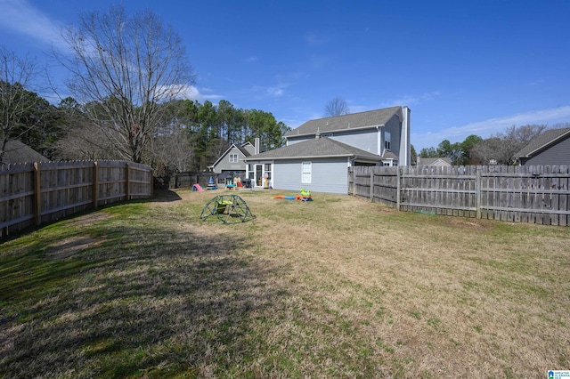 view of yard featuring a fenced backyard