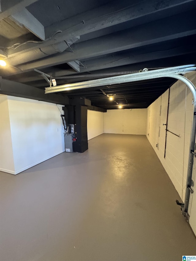 unfinished basement with heating unit