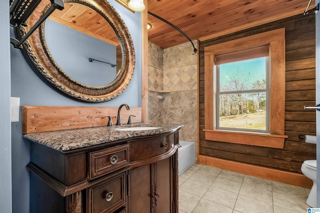 bathroom featuring bathtub / shower combination, toilet, wood ceiling, vanity, and tile patterned floors