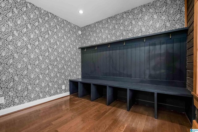 mudroom with baseboards, wood finished floors, and recessed lighting