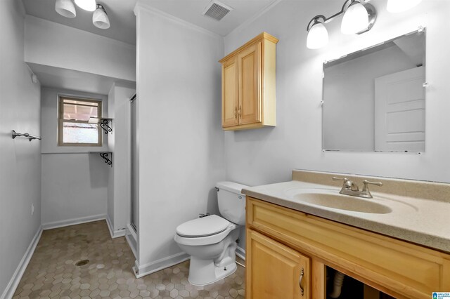 full bath with visible vents, a shower stall, toilet, and vanity